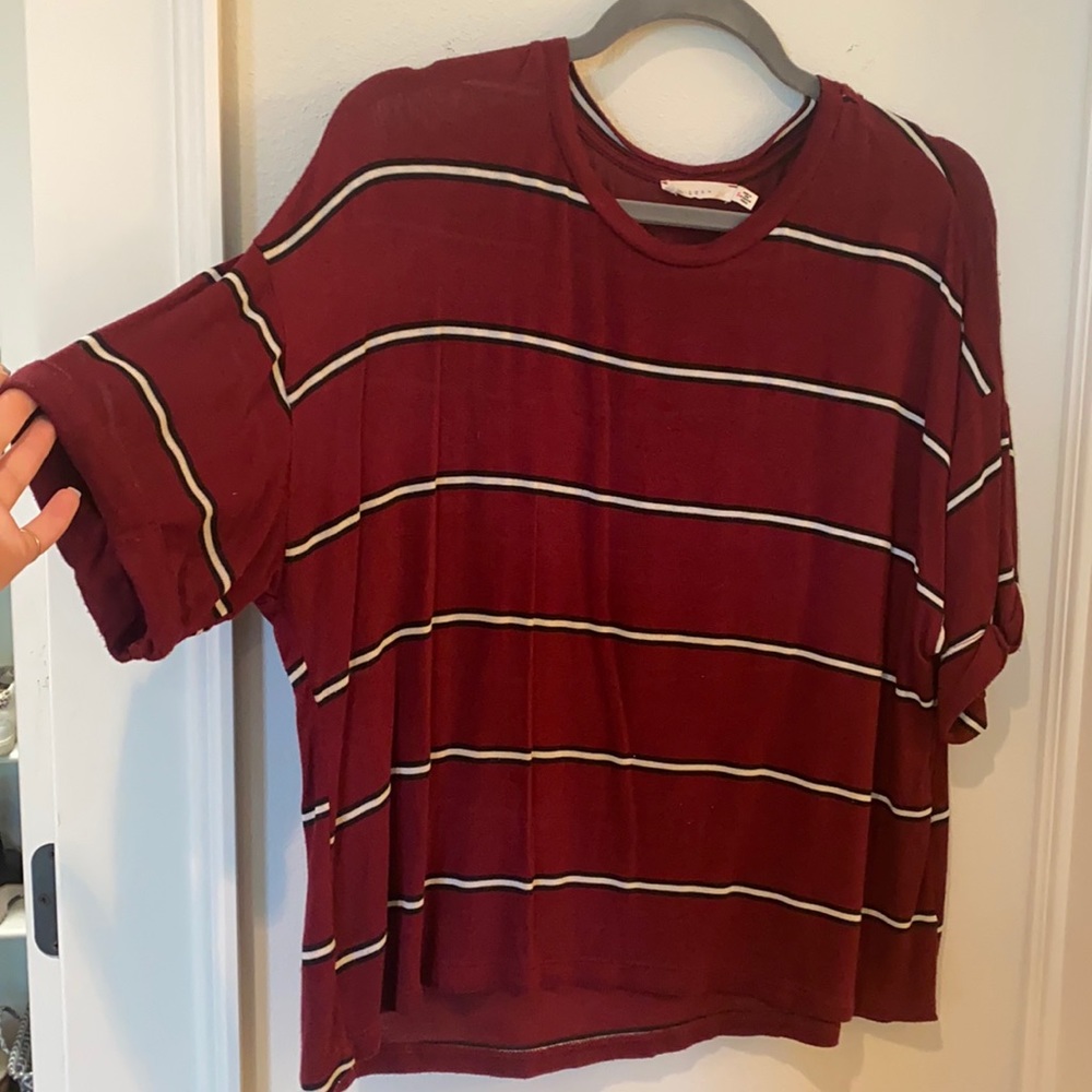 Red, black, and white blouse